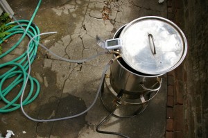 cooling the wort with an immersion chiller cooling the wort with an immersion chiller