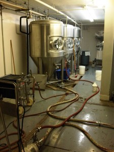 cleaning the conical at san pedro brew co.
